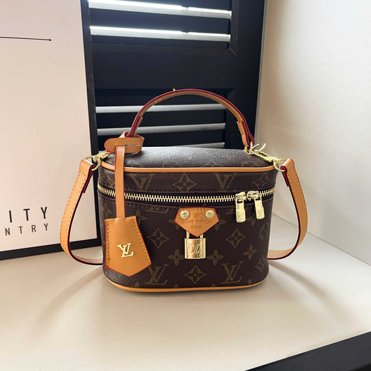 Mála láimhe Bosca Gheobhaidh dream eile - Bosca Tote Monogram Galánta