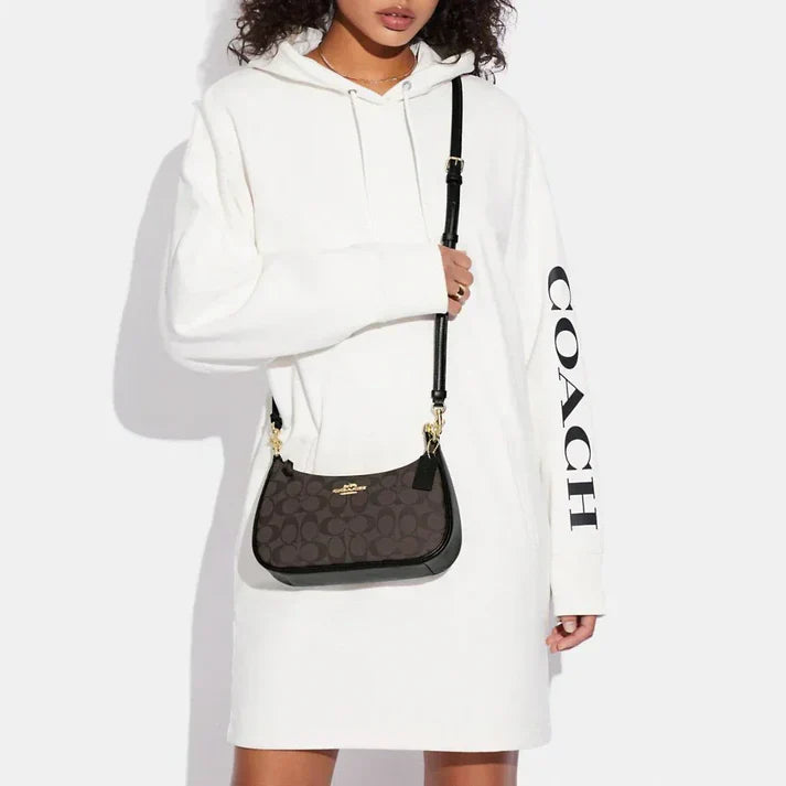 Teri axelväska i signatur canvas i brunt