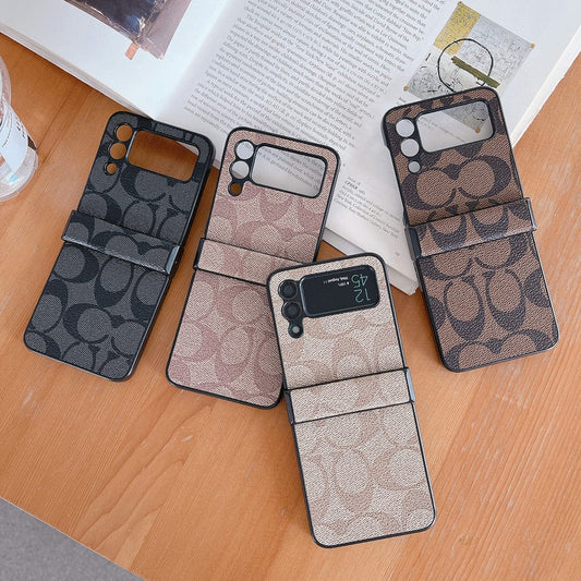 Coach Z Flip/Z Fold Samsung telefonska torbica s remenom za prst