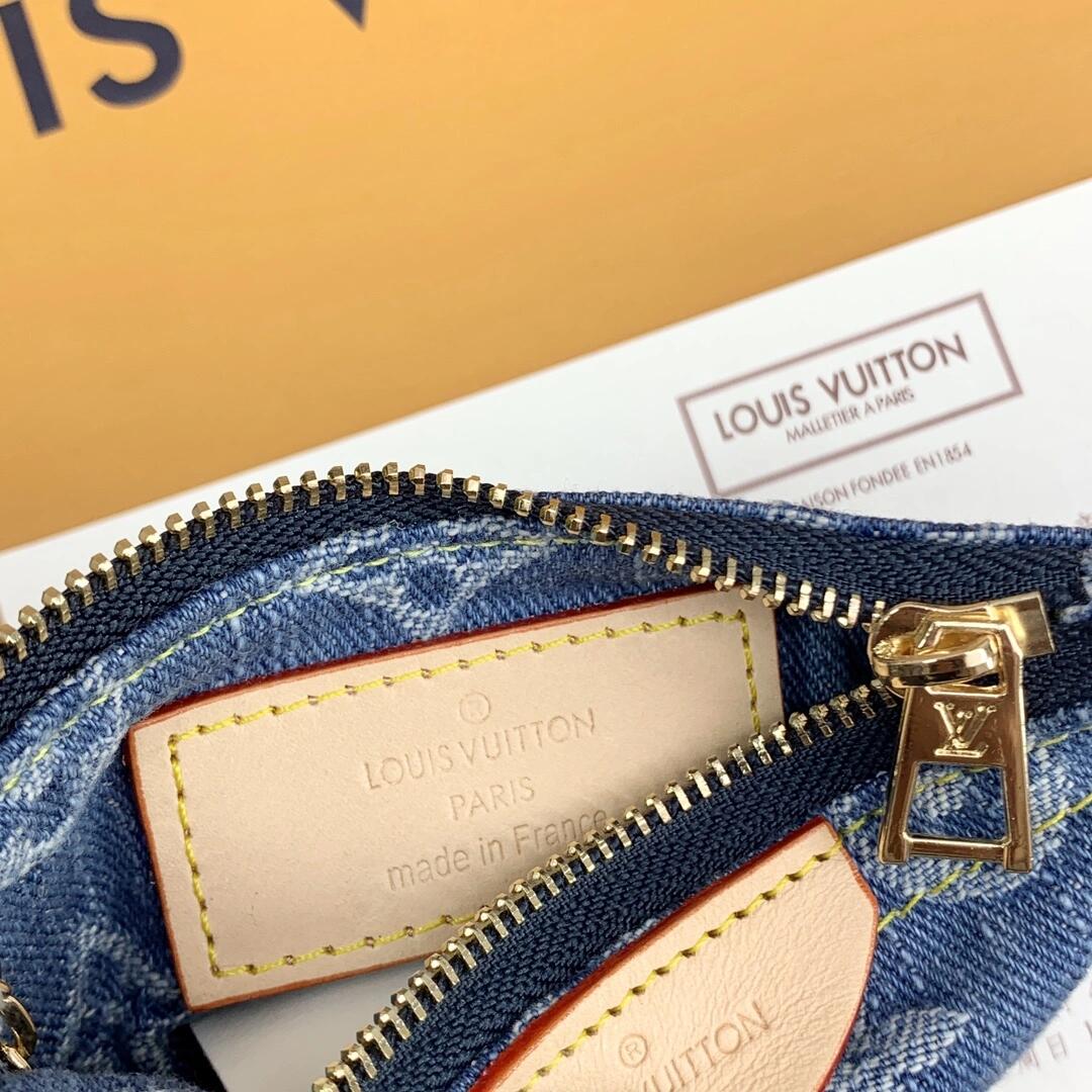 Ylellinen monogrammikolikkopussi – tyylikäs & kompakti avaimenperälompakko