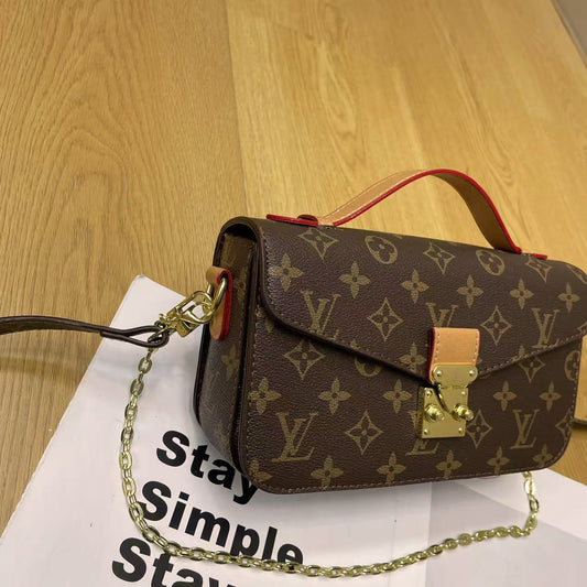 Bolsa de ombro com corrente vintage – design clássico de monograma