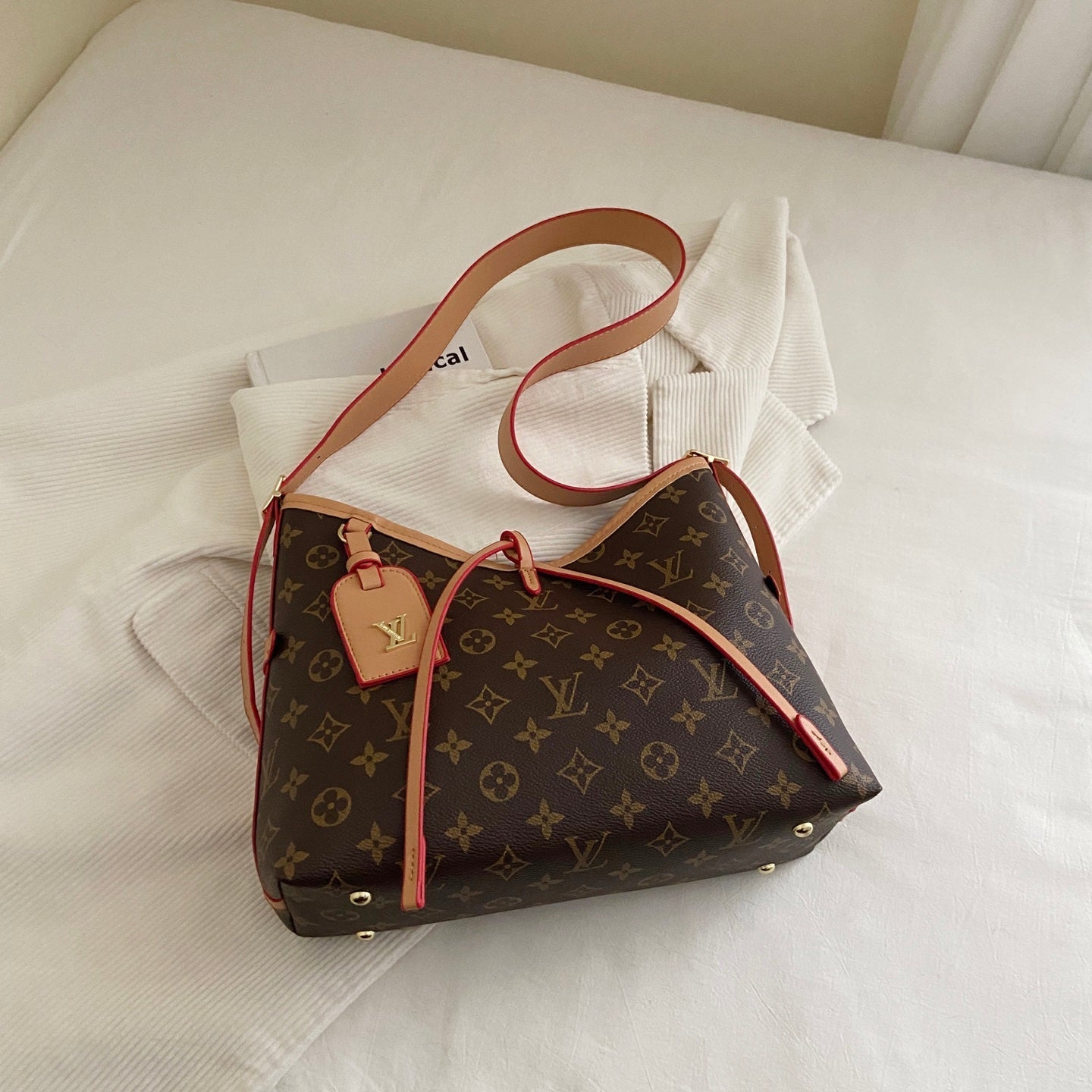 모노그램 크로스 스트랩 숄더백