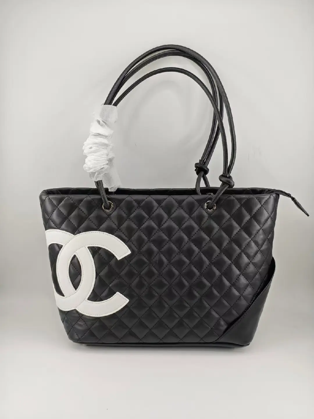 Bolso tote premium estilo cuero acolchado con asas dobles