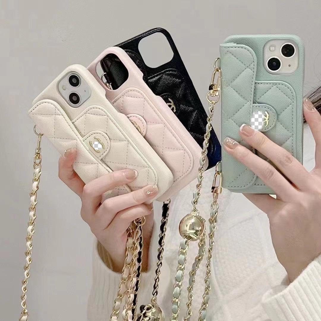 Luxusné peňaženkové puzdro na iPhone s retiazkou na ruku/cez telo