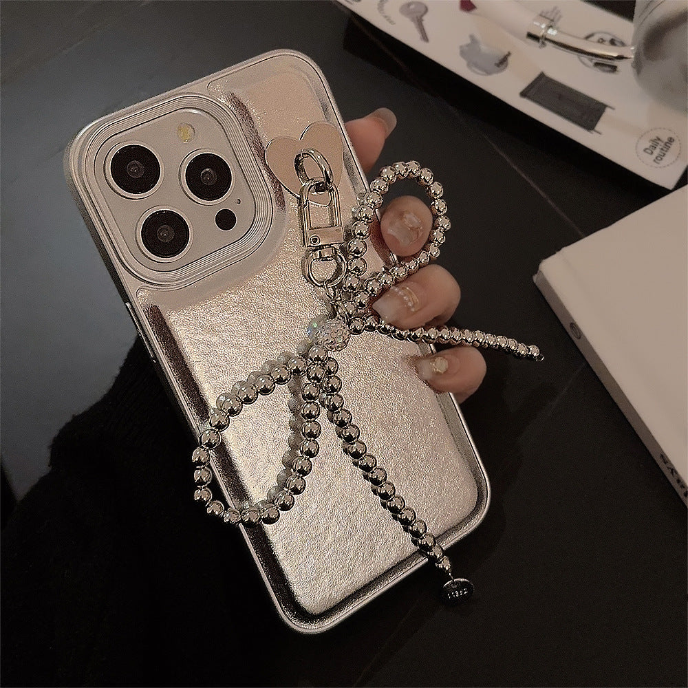 Silver leather for Apple 16 mobile phone case iPhone17promax electroplated bow pendant 11 temperament 13