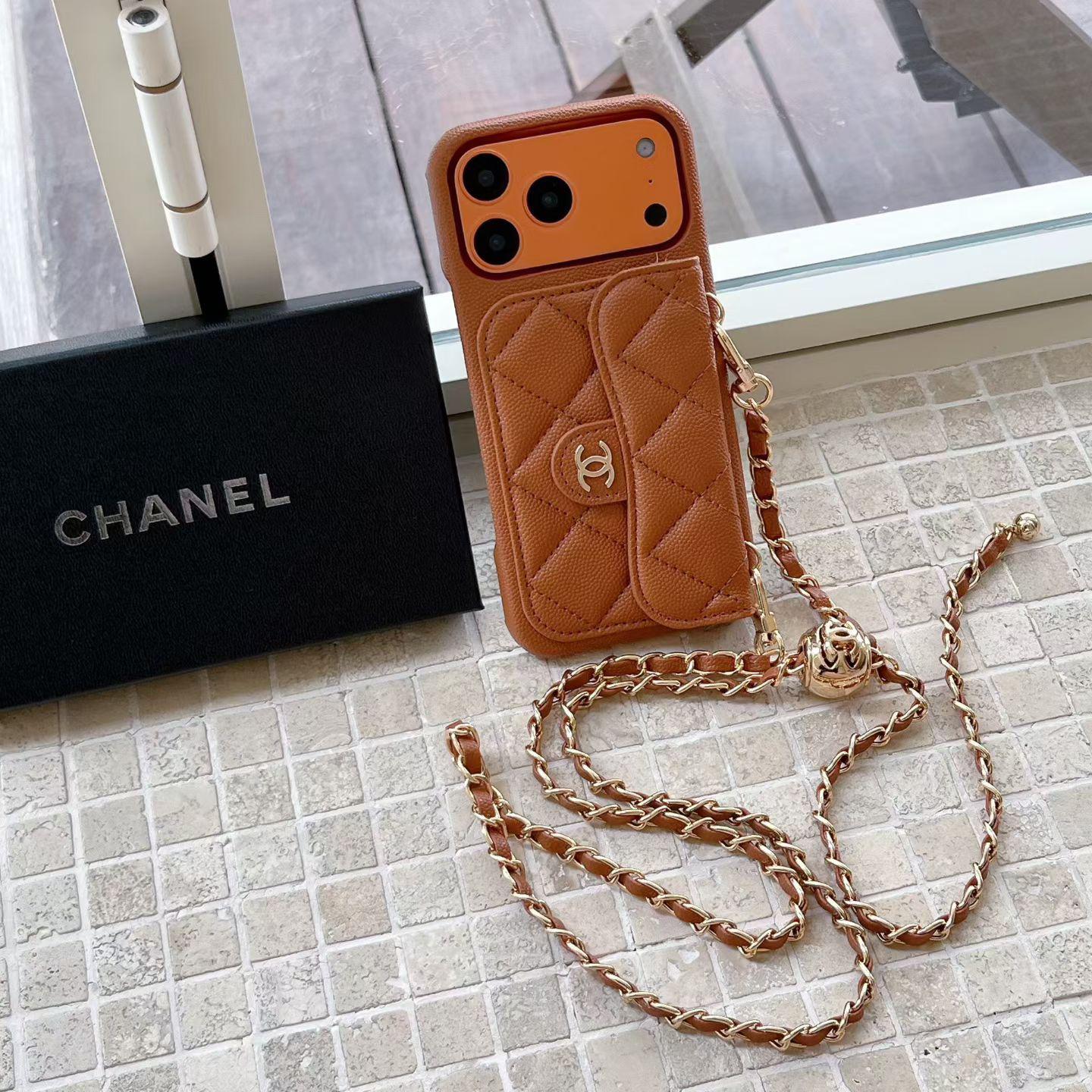 Luxusné peňaženkové puzdro na iPhone s retiazkou na ruku/cez telo